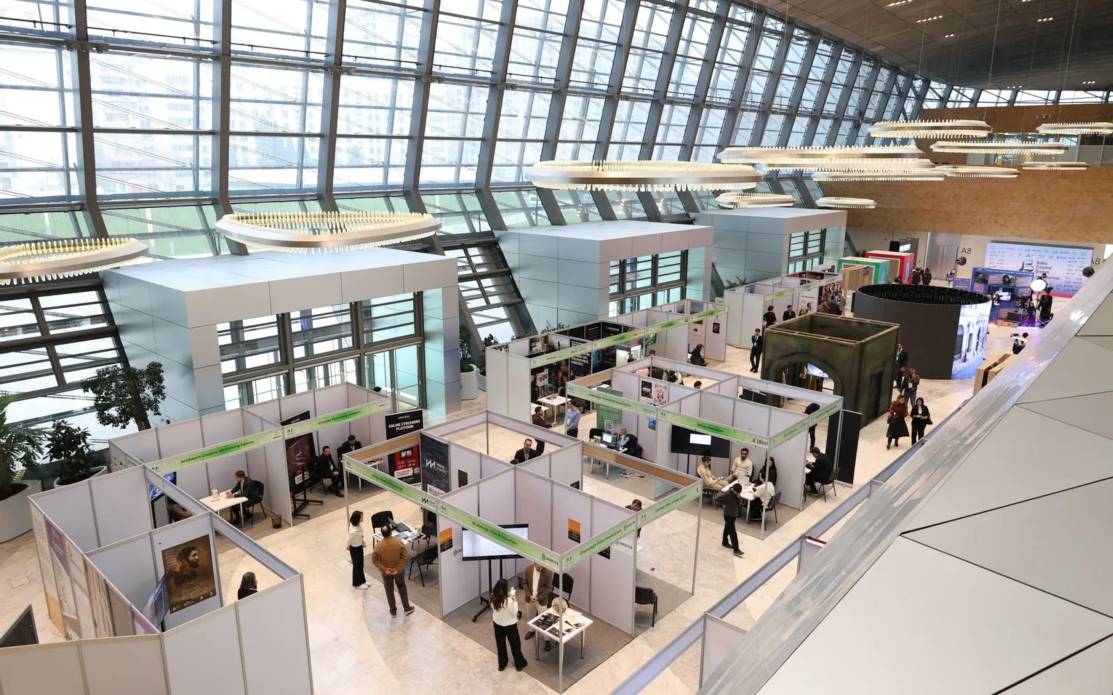 Exhibition hall with stands seen from above