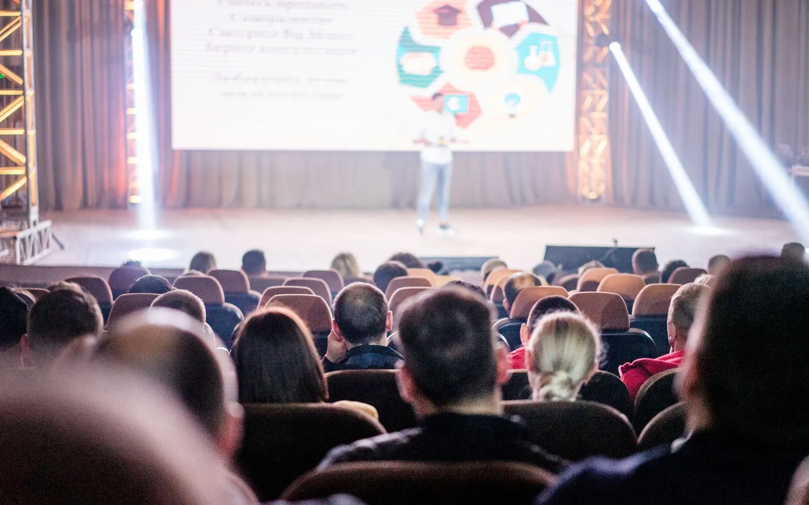 Audience watching a keynote presentation